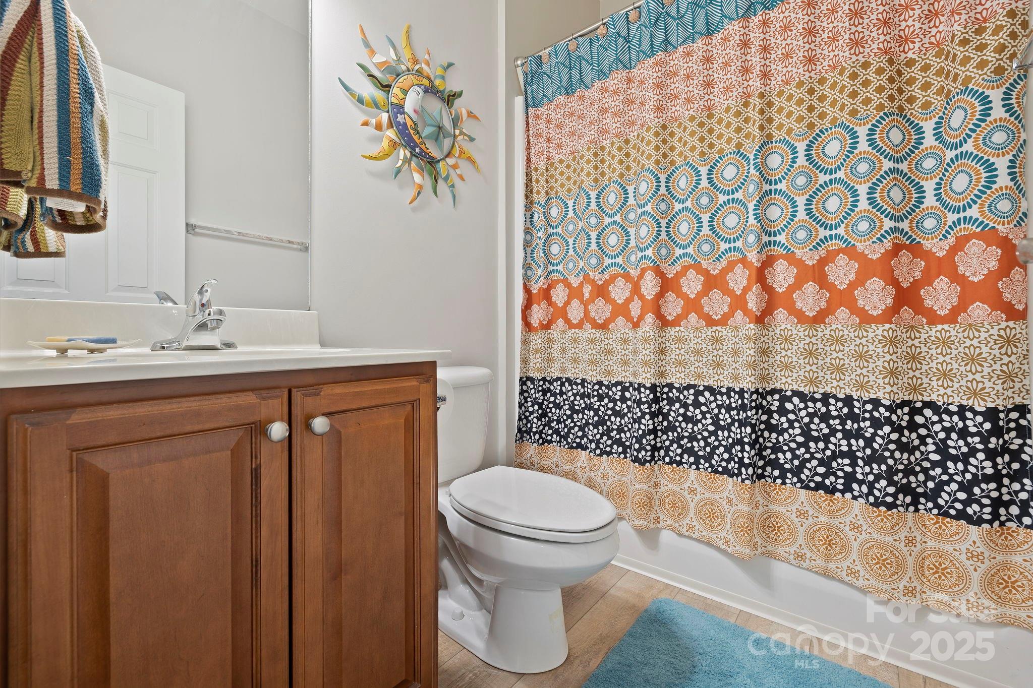258 Lumber River Road Fletcher, NC 28732 - Photo 27 of 44 a bathroom with a sink toilet and shower