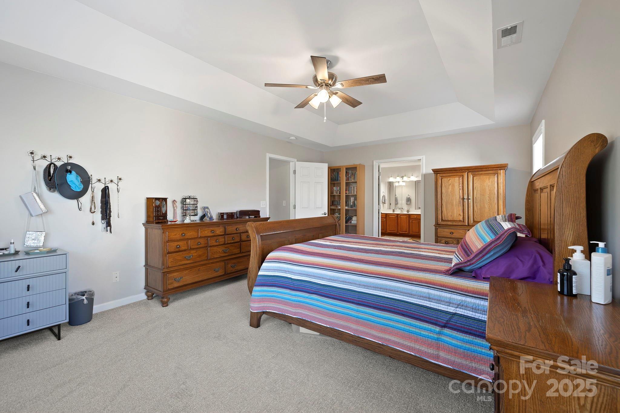 258 Lumber River Road Fletcher, NC 28732 - Photo 40 of 48 a bedroom with furniture and a flat screen tv