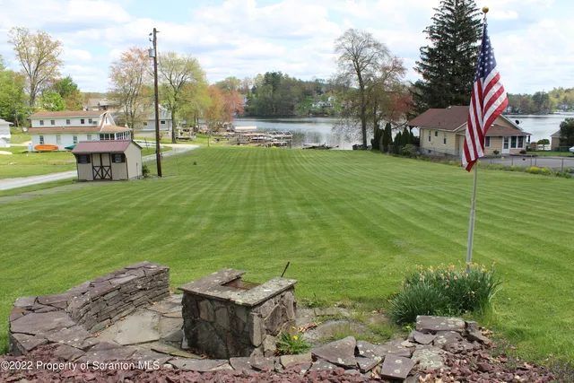 a view of a garden with houses