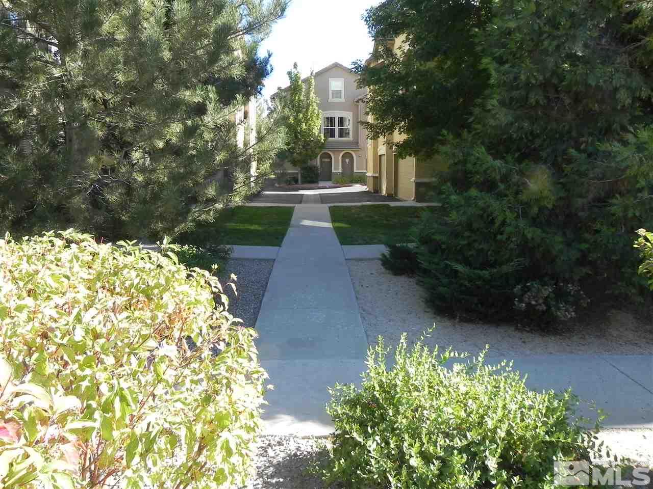 9050 Double R Boulevard, Unit 1112 Reno, NV 89521 - Photo 3 of 24 a view of backyard with green space