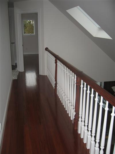 Undisclosed Address Orleans, MA 02653 - Photo 12 of 22 a view of a hallway with wooden floor