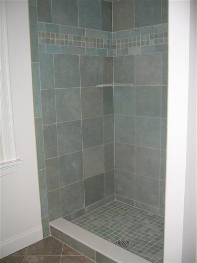 Undisclosed Address Orleans, MA 02653 - Photo 14 of 22 a bathroom with a shower