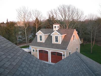 Undisclosed Address Orleans, MA 02653 - Photo 17 of 22 a view of a house with a yard