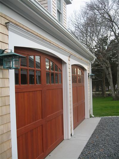 Undisclosed Address Orleans, MA 02653 - Photo 18 of 22 a front view of a house with garden