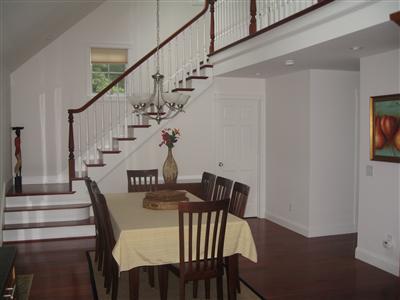 Undisclosed Address Orleans, MA 02653 - Photo 10 of 22 a view of entryway dining room and hall with wooden floor