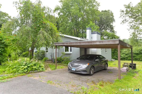 a car parked in front of a house