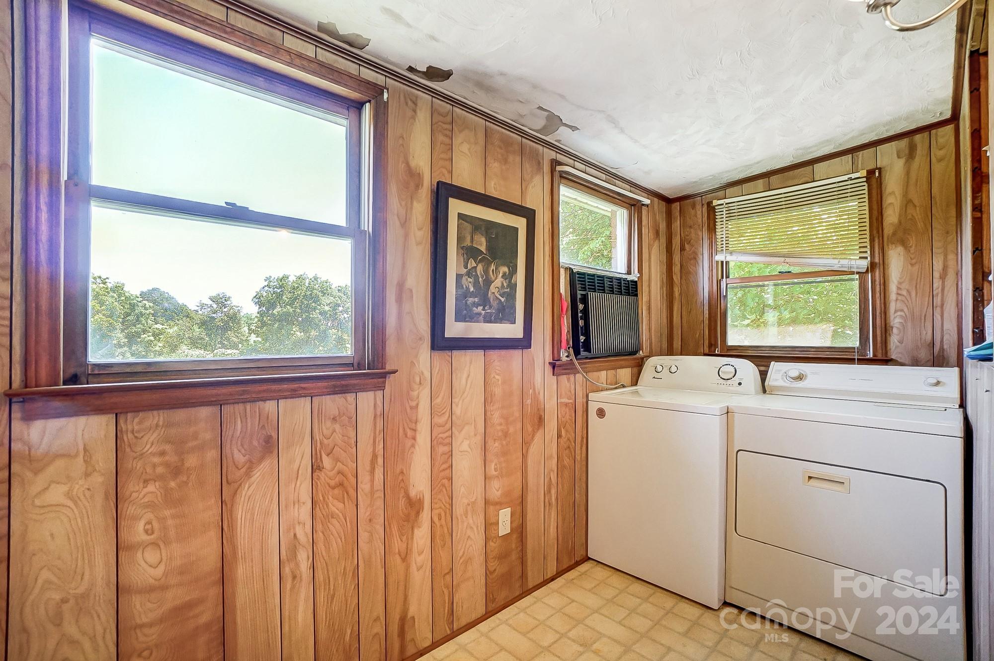 3760 Woodleaf Road Salisbury, NC 28147 - Photo 20 of 31 a view of washer and dryer next to a window