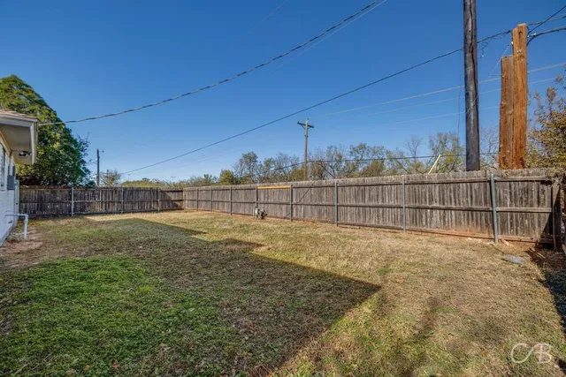 a front view of house with yard and seating space