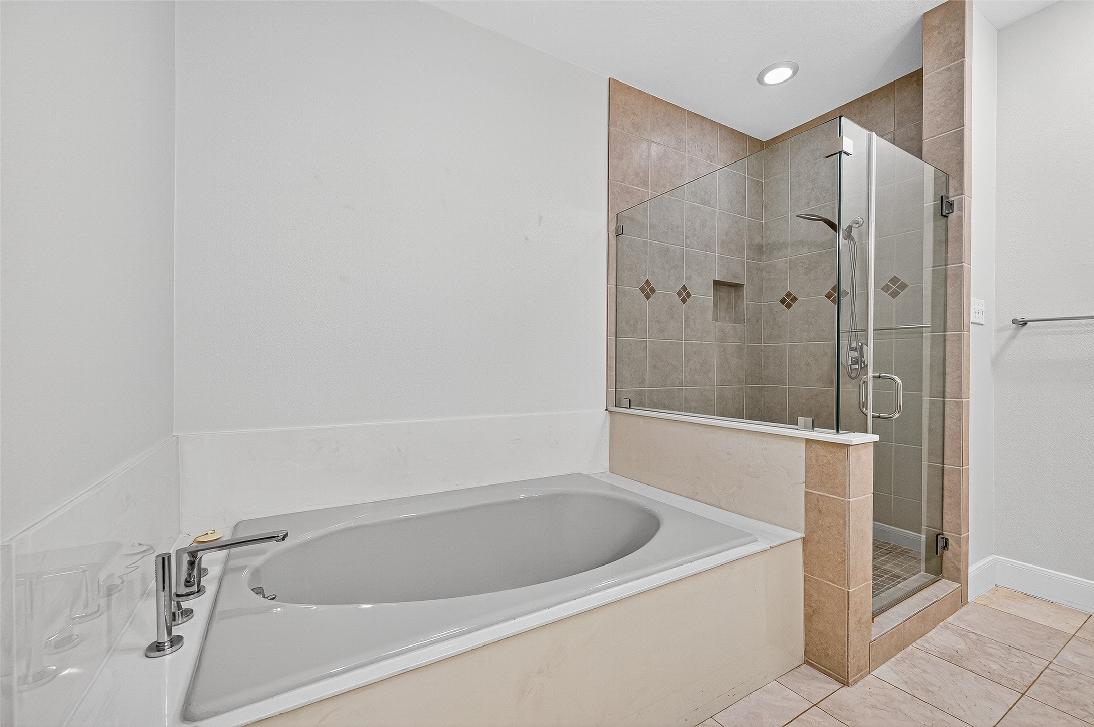 3027 Bissonnet Street Houston, TX 77005 - Photo 41 of 47 Primary bath with soaking tub and separate glass shower — a nice way to end a long day
