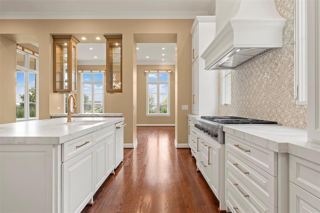 1600 Ridgewood Drive Waco, TX 76710 - Photo 14 of 40 a kitchen with stainless steel appliances granite countertop a stove and a sink