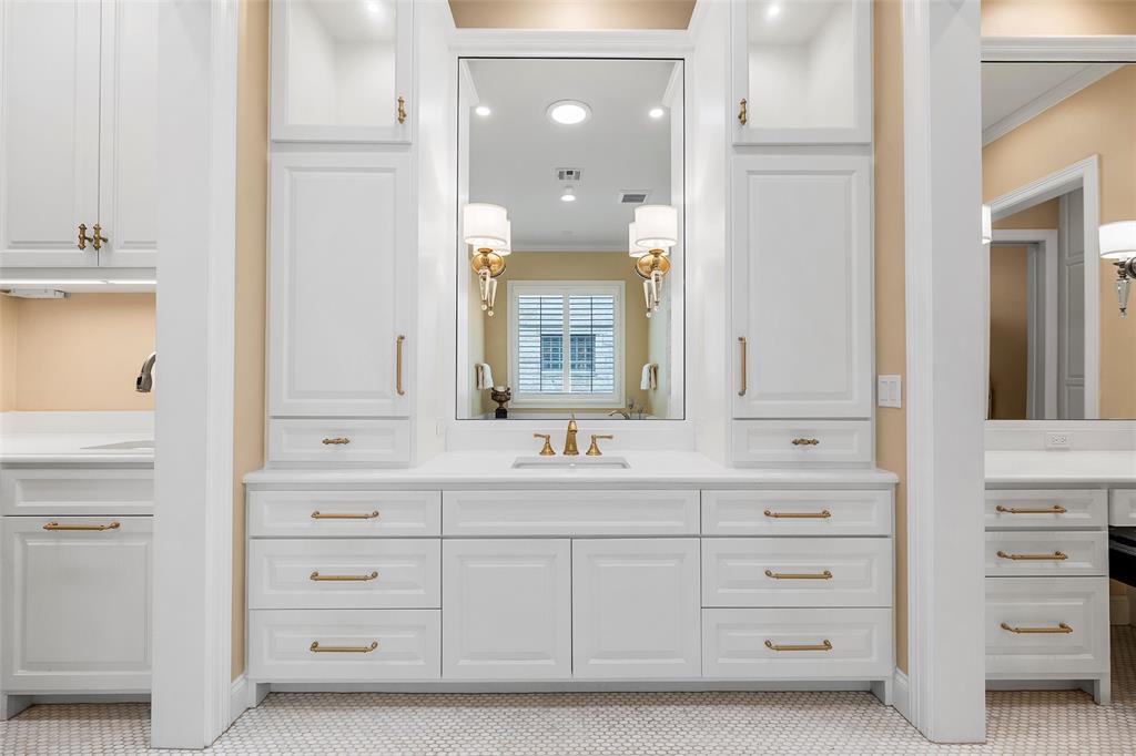 1600 Ridgewood Drive Waco, TX 76710 - Photo 31 of 40 a bathroom with a sink vanity and mirror