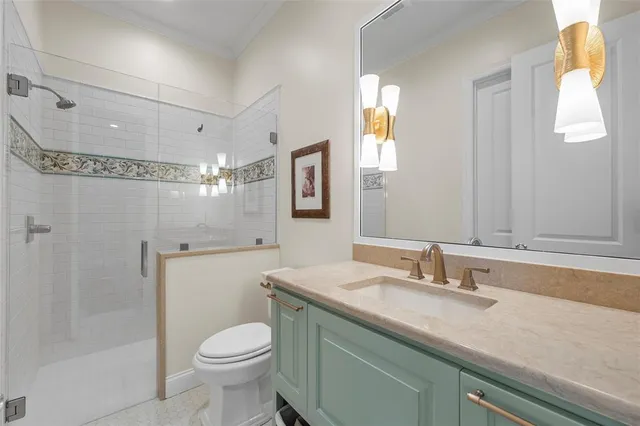 a bathroom with a tub a sink and a window