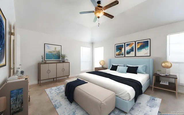 an empty room with windows and fan