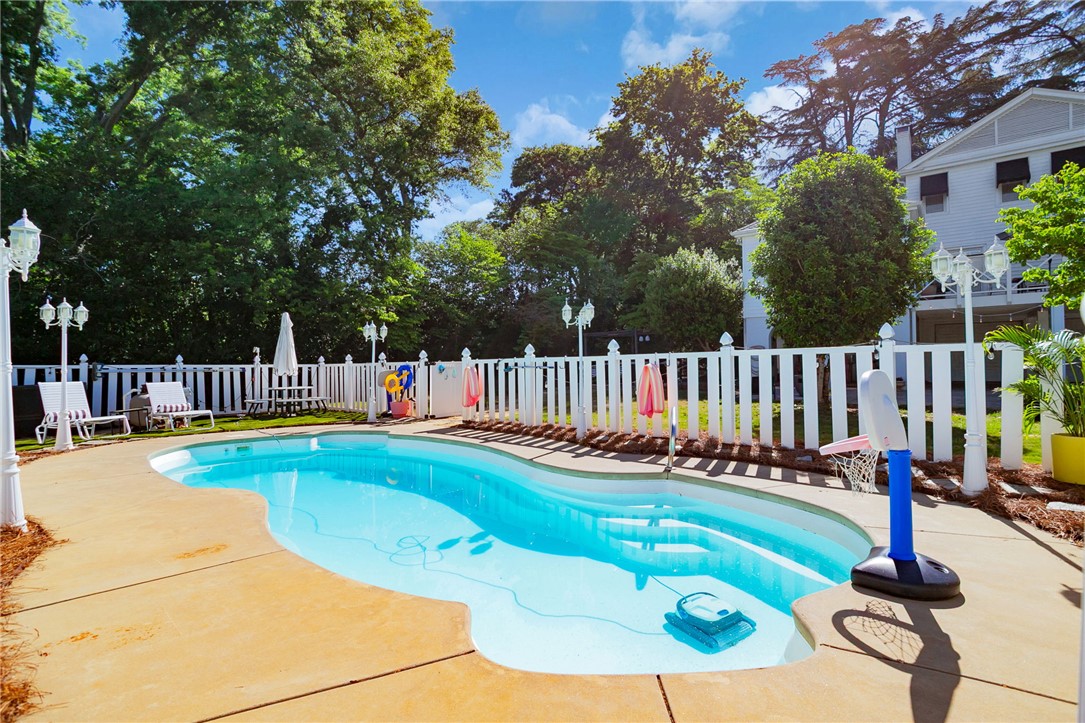 1107 Springdale Road Anderson, SC 29621 - Photo 40 of 49 An inviting backyard oasis features a free-form pool, perfect for leisure and recreation.