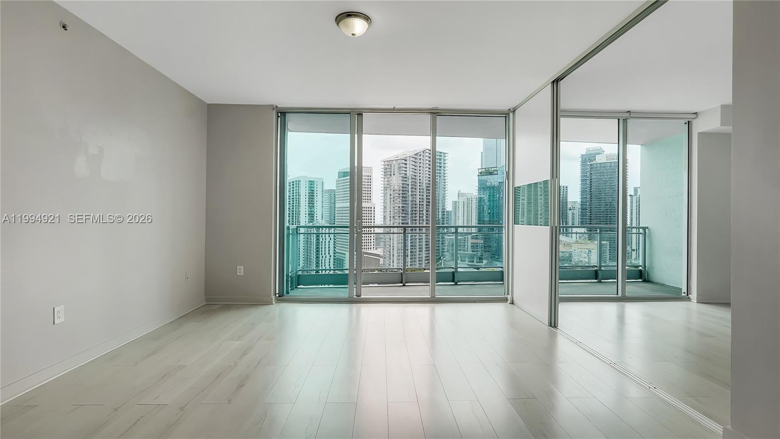 90 Southwest 3rd Street, Unit 3003 Miami, FL 33130 - Photo 13 of 47 a view of entryway with wooden floor