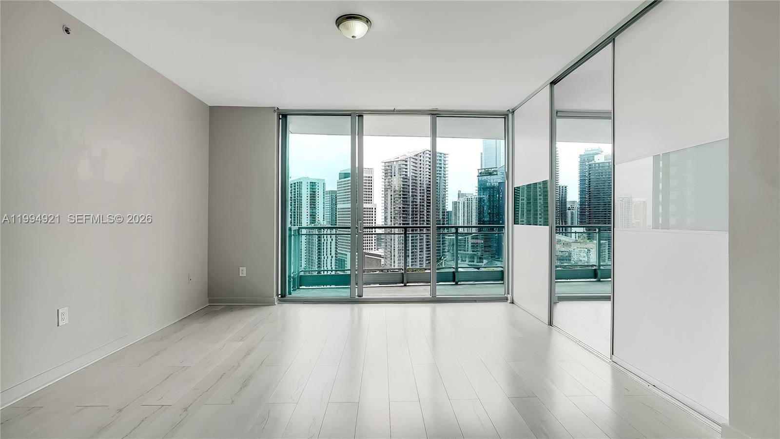 90 Southwest 3rd Street, Unit 3003 Miami, FL 33130 - Photo 14 of 47 a view of entryway with wooden floor
