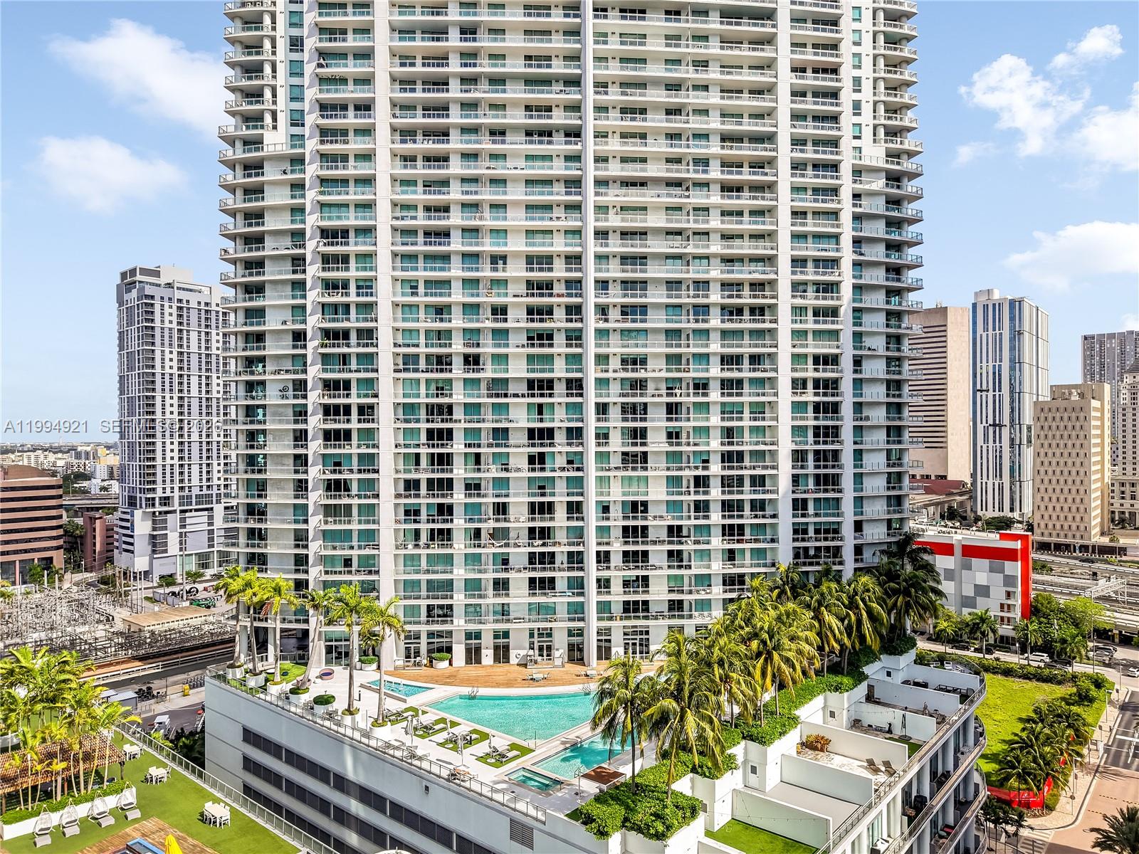 90 Southwest 3rd Street, Unit 3003 Miami, FL 33130 - Photo 2 of 47 a view of a balcony with a outdoor seating