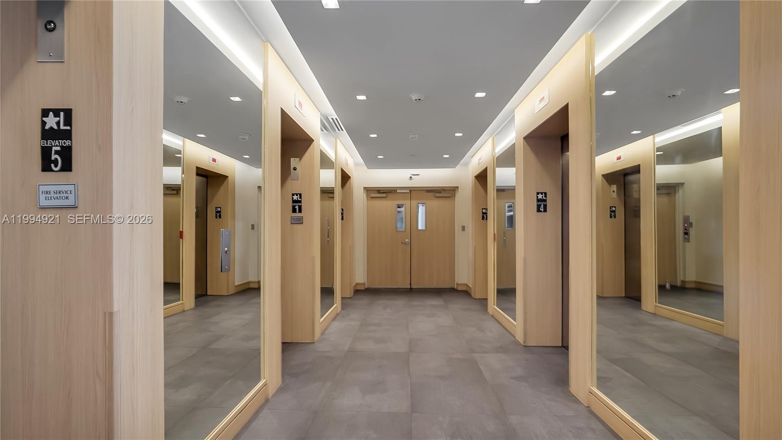 90 Southwest 3rd Street, Unit 3003 Miami, FL 33130 - Photo 40 of 47 a view of a hallway with closet and a bathroom