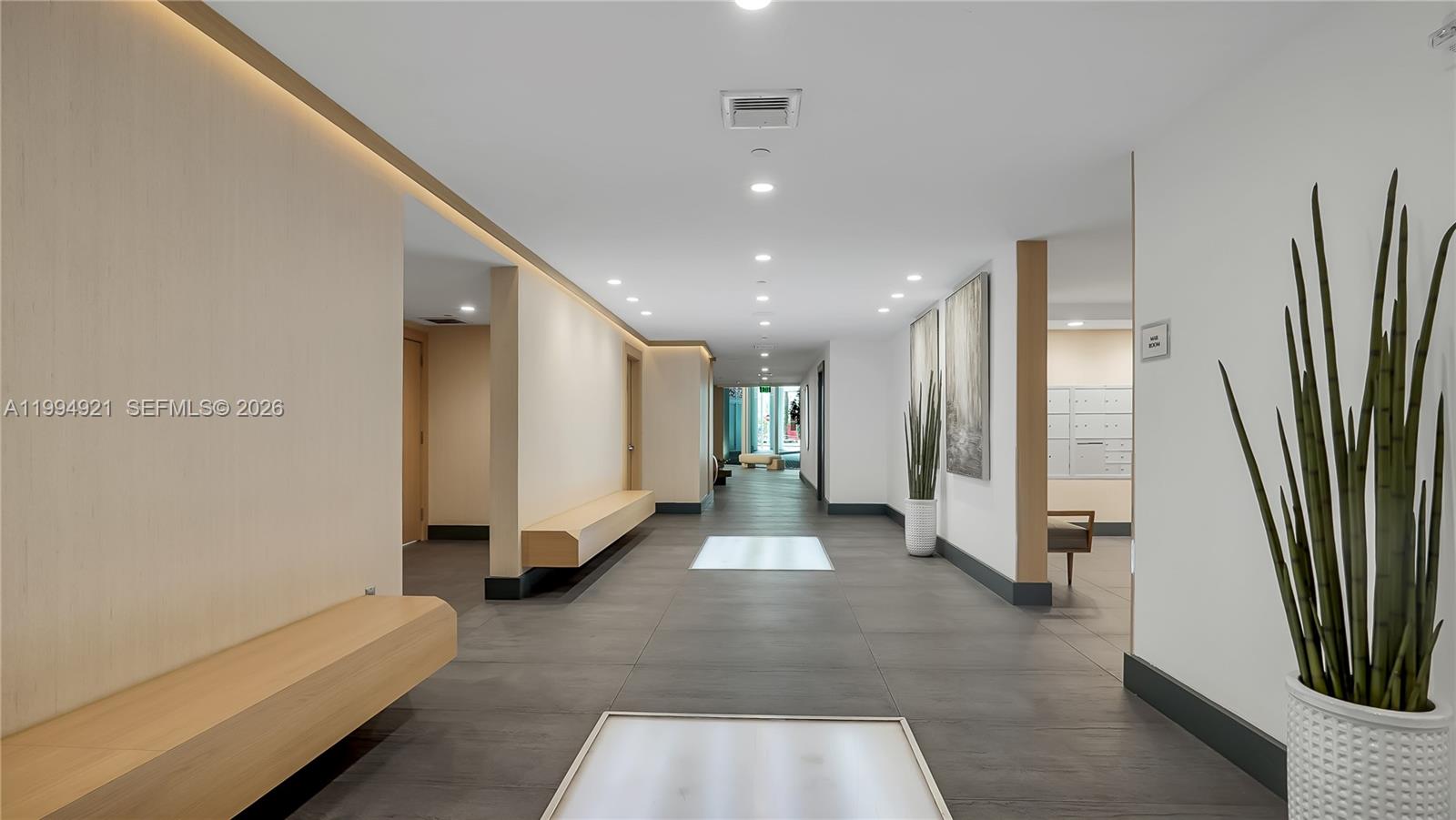 90 Southwest 3rd Street, Unit 3003 Miami, FL 33130 - Photo 43 of 47 a view of a hallway with a couch and a couch