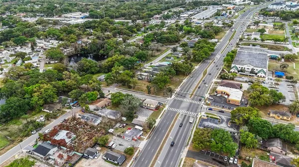 a view of street with large tree