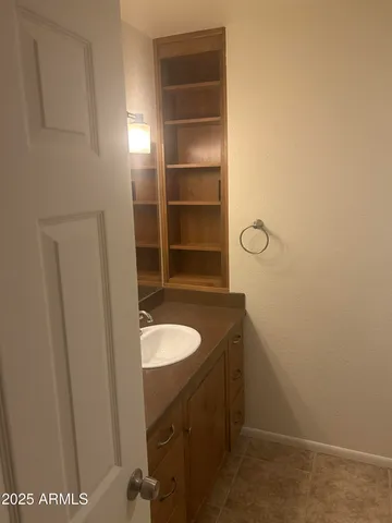 a bathroom with a tub and a shower