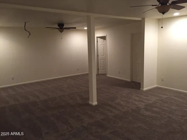 a view of a room with an empty space