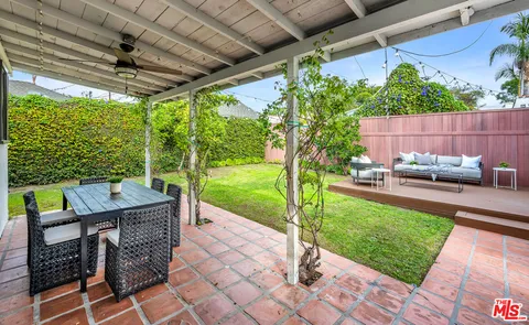 a building outdoor space with patio furniture