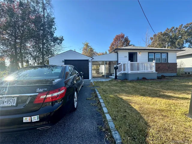 a view of a house with roof deck