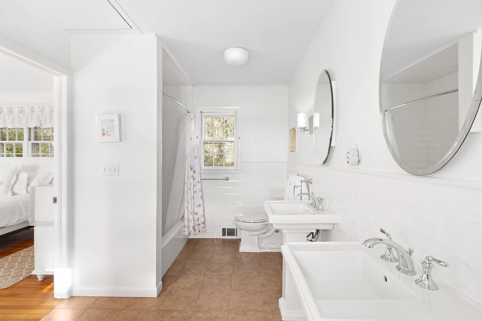 69 Ferry Road Sag Harbor, NY 11963 - Photo 12 of 17 a bathroom with a sink and a mirror