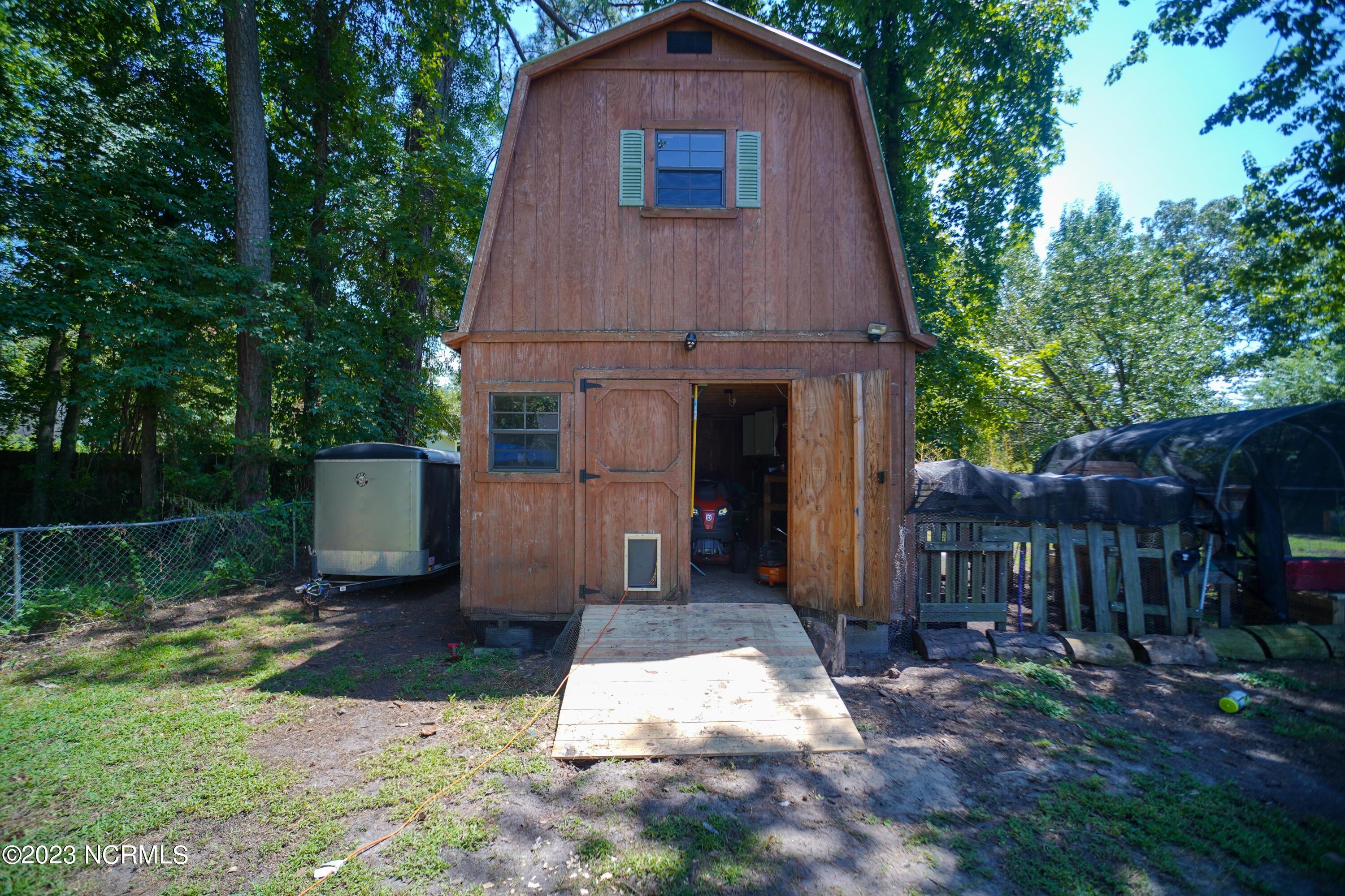 102 Nottingham Road Jacksonville, NC 28546 - Photo 51 of 61 102 Nottingham shed