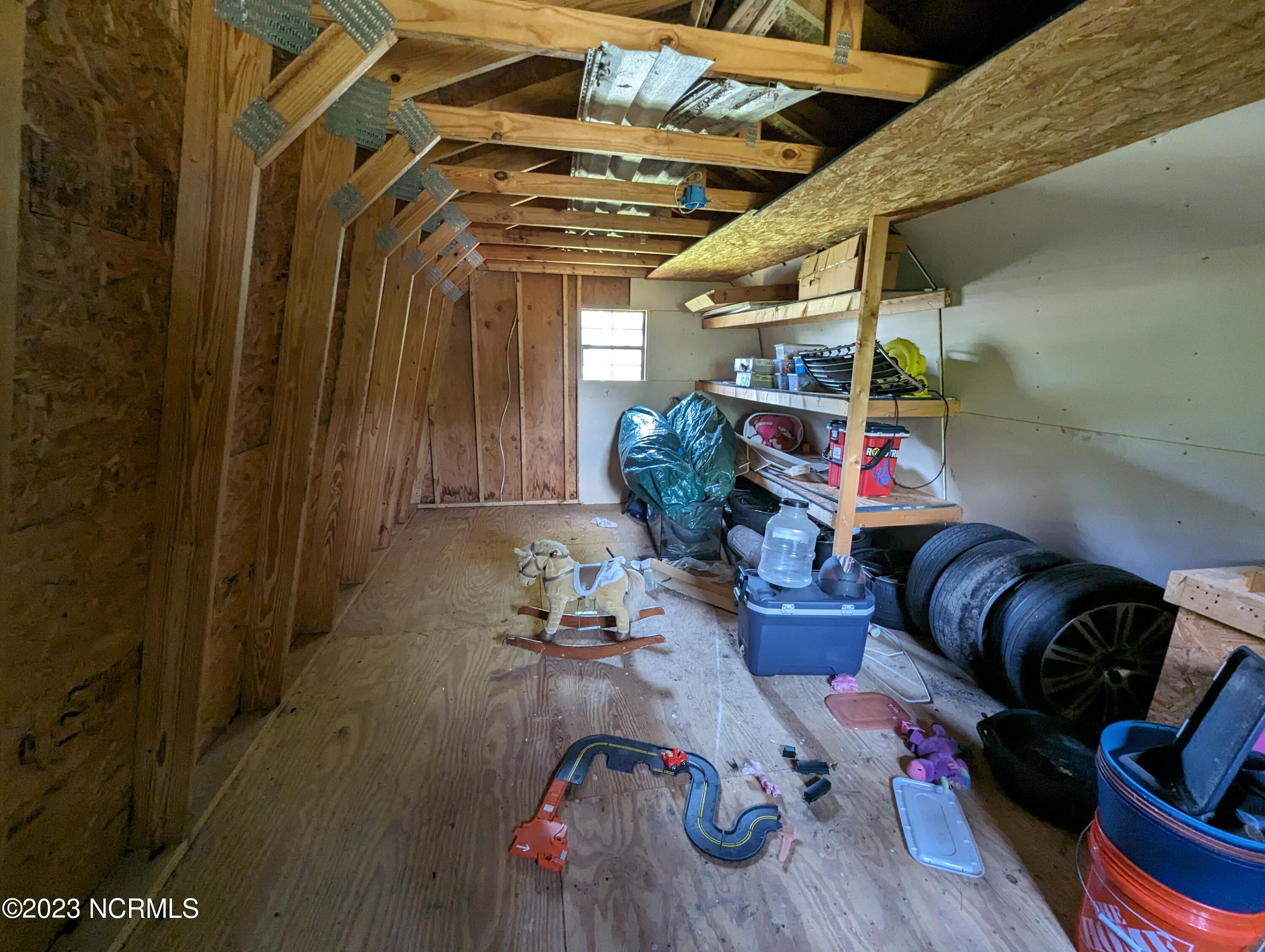 102 Nottingham Road Jacksonville, NC 28546 - Photo 56 of 61 102 Nottingham shed inside 3