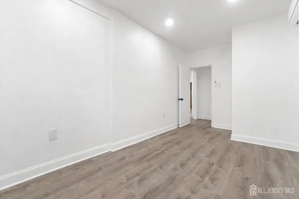 a view of small space with wooden floor