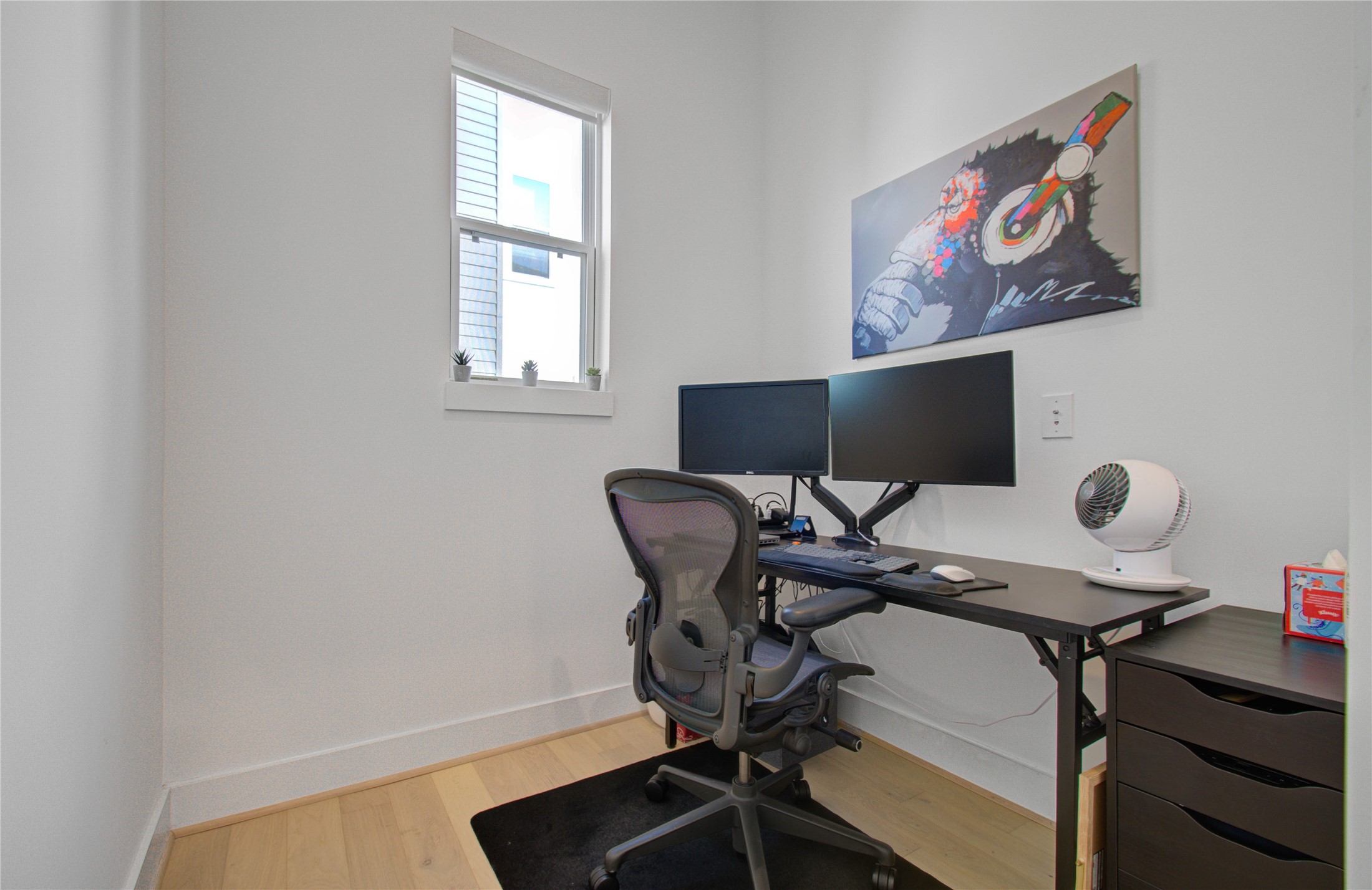 3032 Lamar Street Houston, TX 77003 - Photo 23 of 37 a view of a workspace with furniture and a window