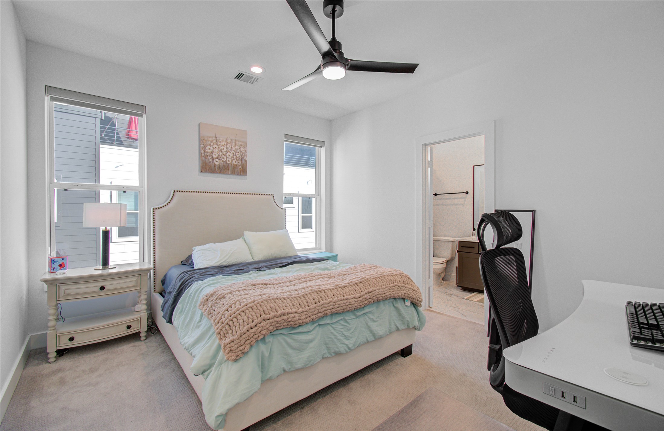 3032 Lamar Street Houston, TX 77003 - Photo 26 of 37 a bedroom with a bed and a window