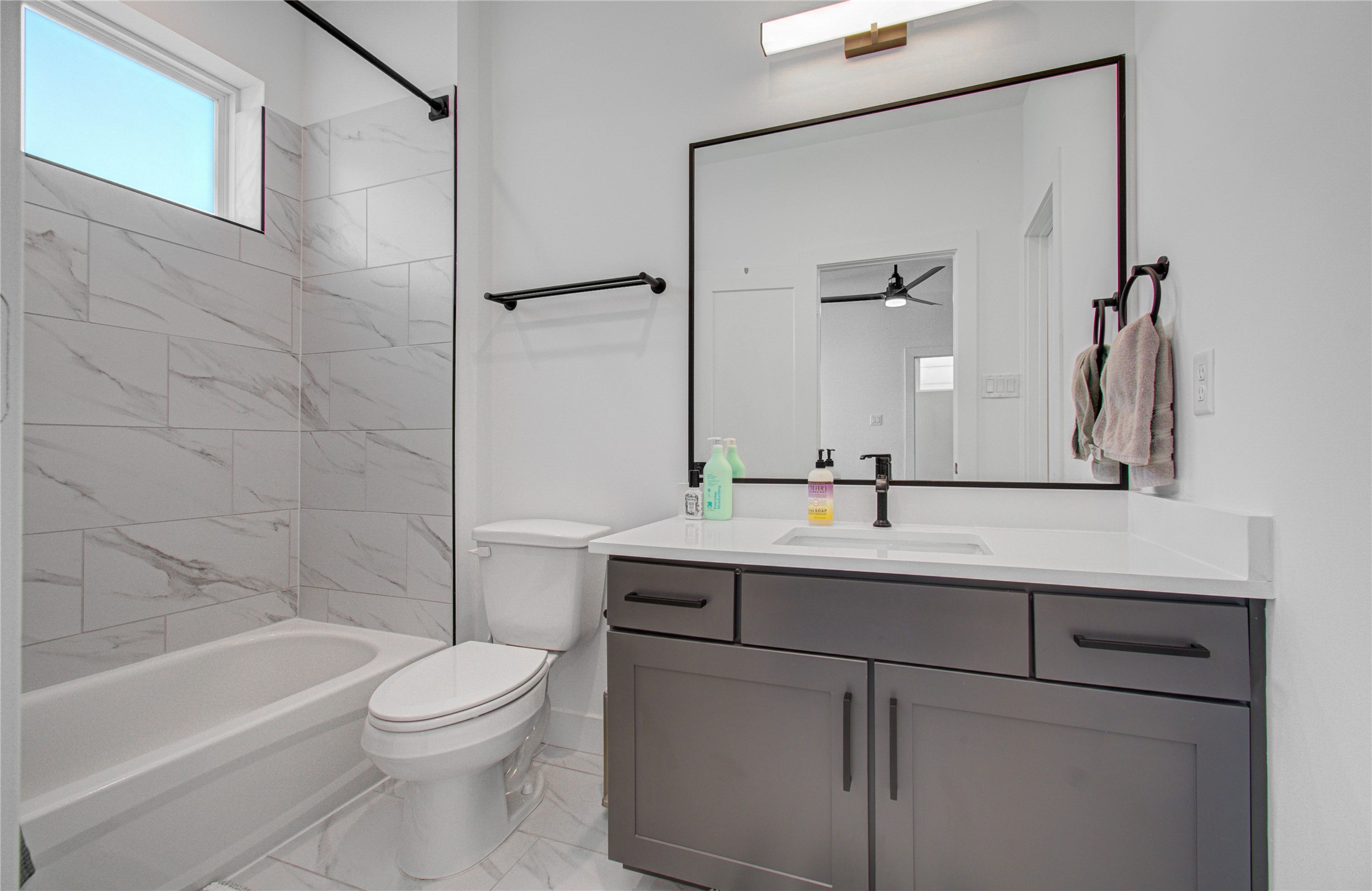 3032 Lamar Street Houston, TX 77003 - Photo 28 of 37 a bathroom with a sink a toilet and shower