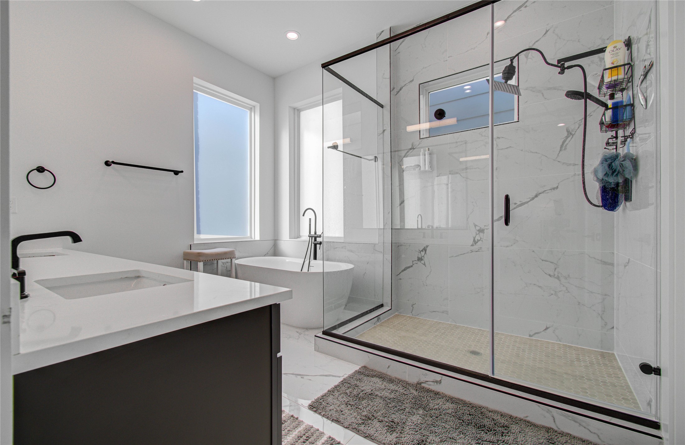 3032 Lamar Street Houston, TX 77003 - Photo 34 of 37 a bathroom with a double vanity sink mirror and shower