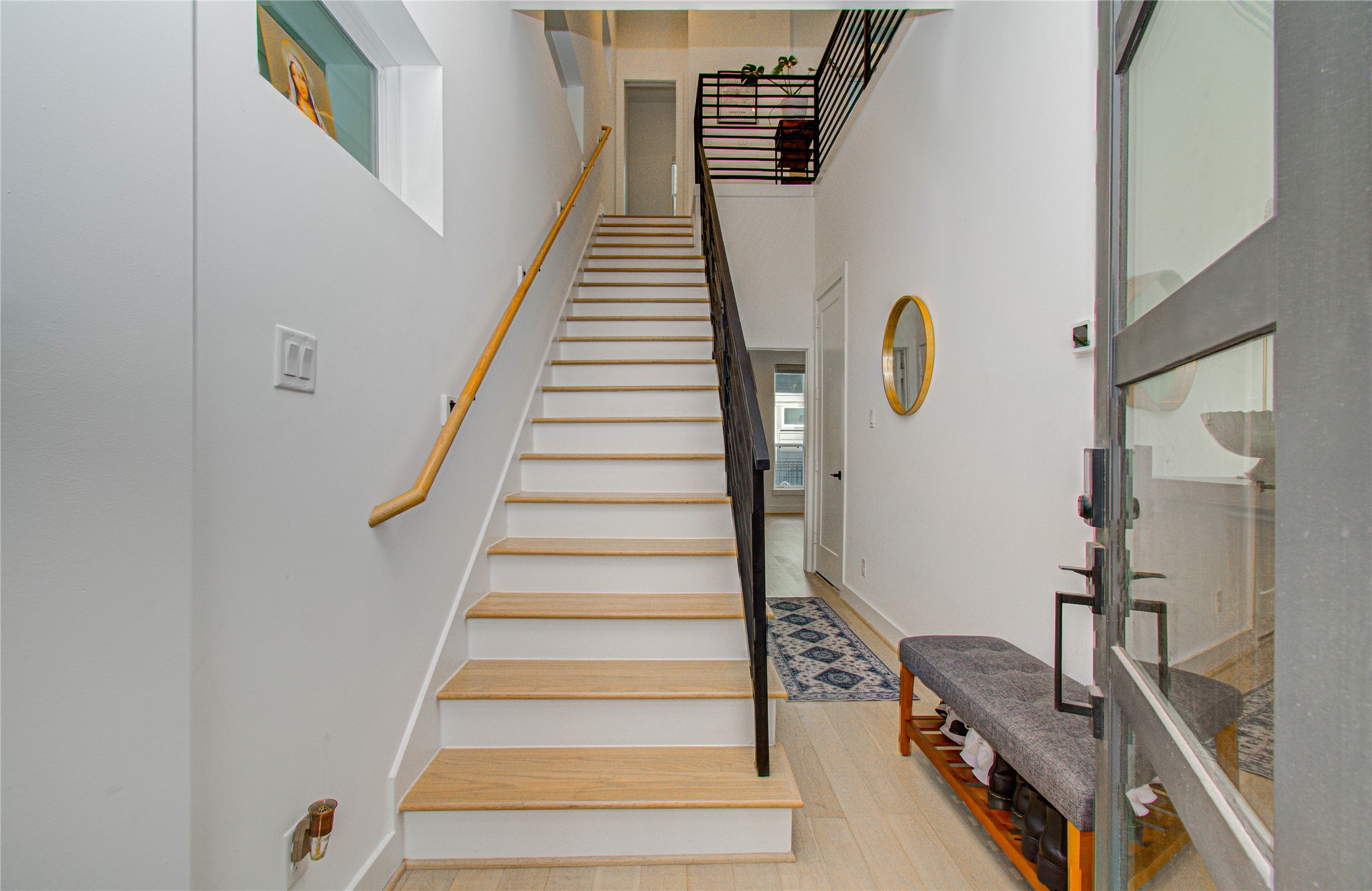 3032 Lamar Street Houston, TX 77003 - Photo 5 of 37 a view of entryway and hall with wooden floor
