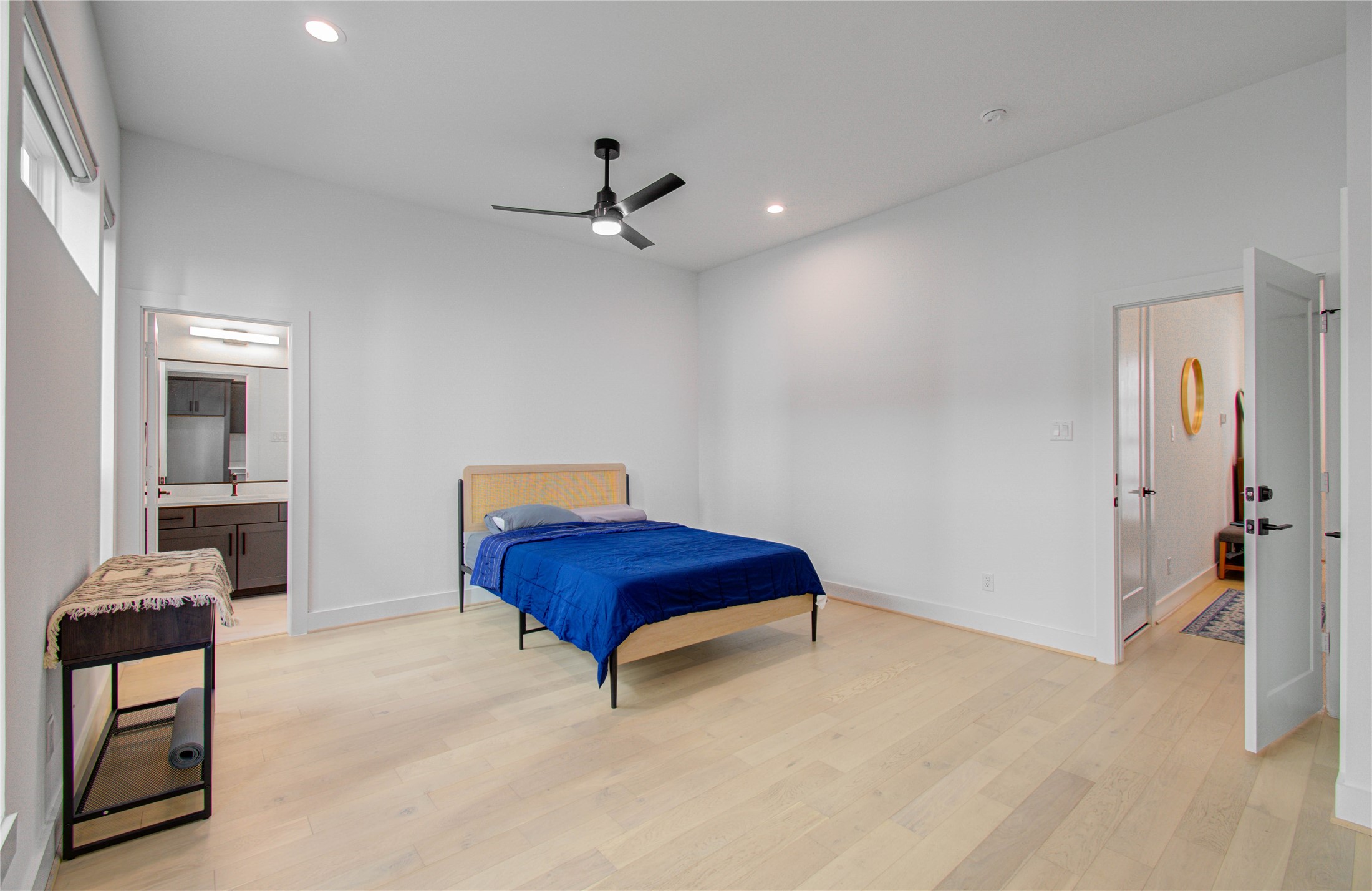 3032 Lamar Street Houston, TX 77003 - Photo 8 of 37 a bedroom with a bed and furniture