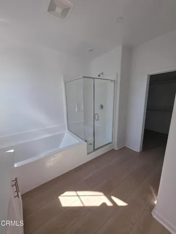 a view of a closet area with racks