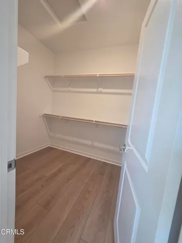 a view of an empty walk in closet