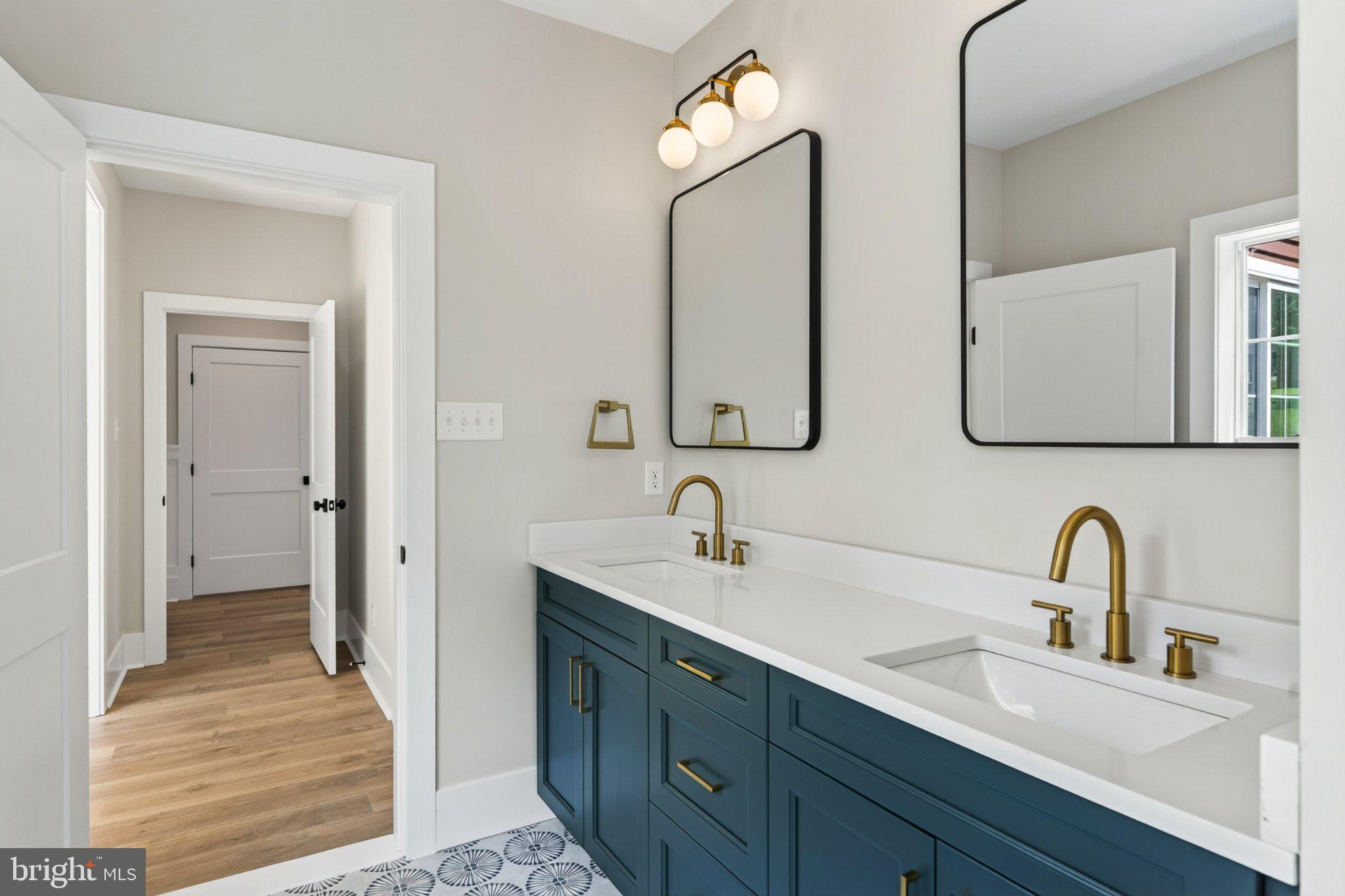 2069 Dutton Mill Road Newtown Square, PA 19073 - Photo 21 of 70 Sleek dual vanity with modern accents.