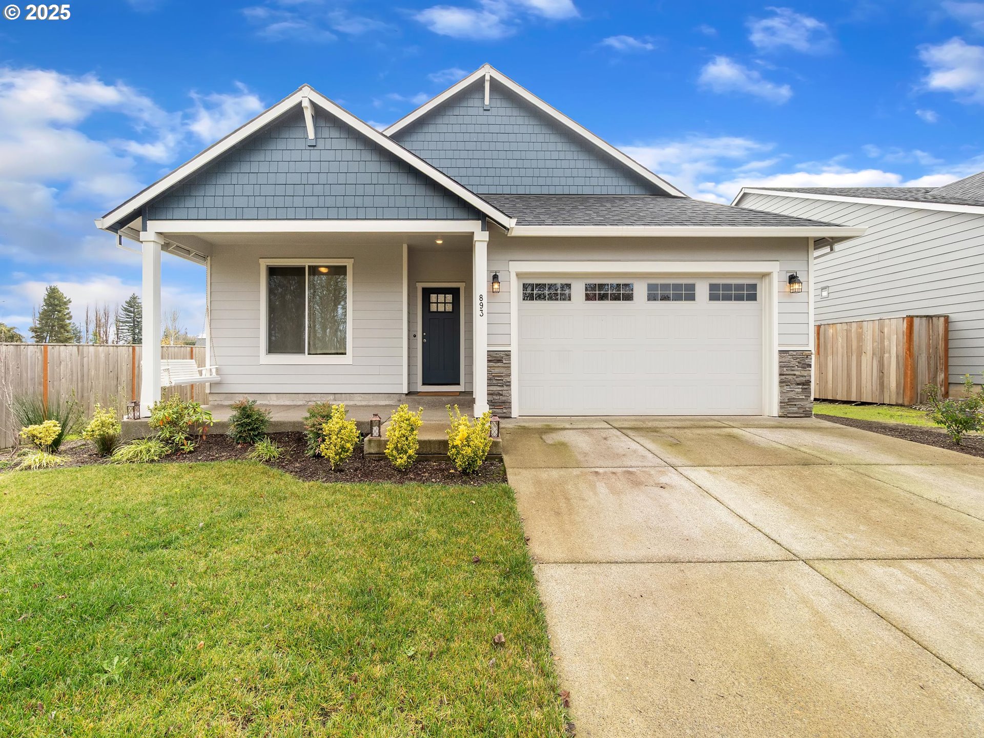 893 East Cleveland Street Carlton, OR 97111 - Photo 1 of 19 a front view of a house with yard