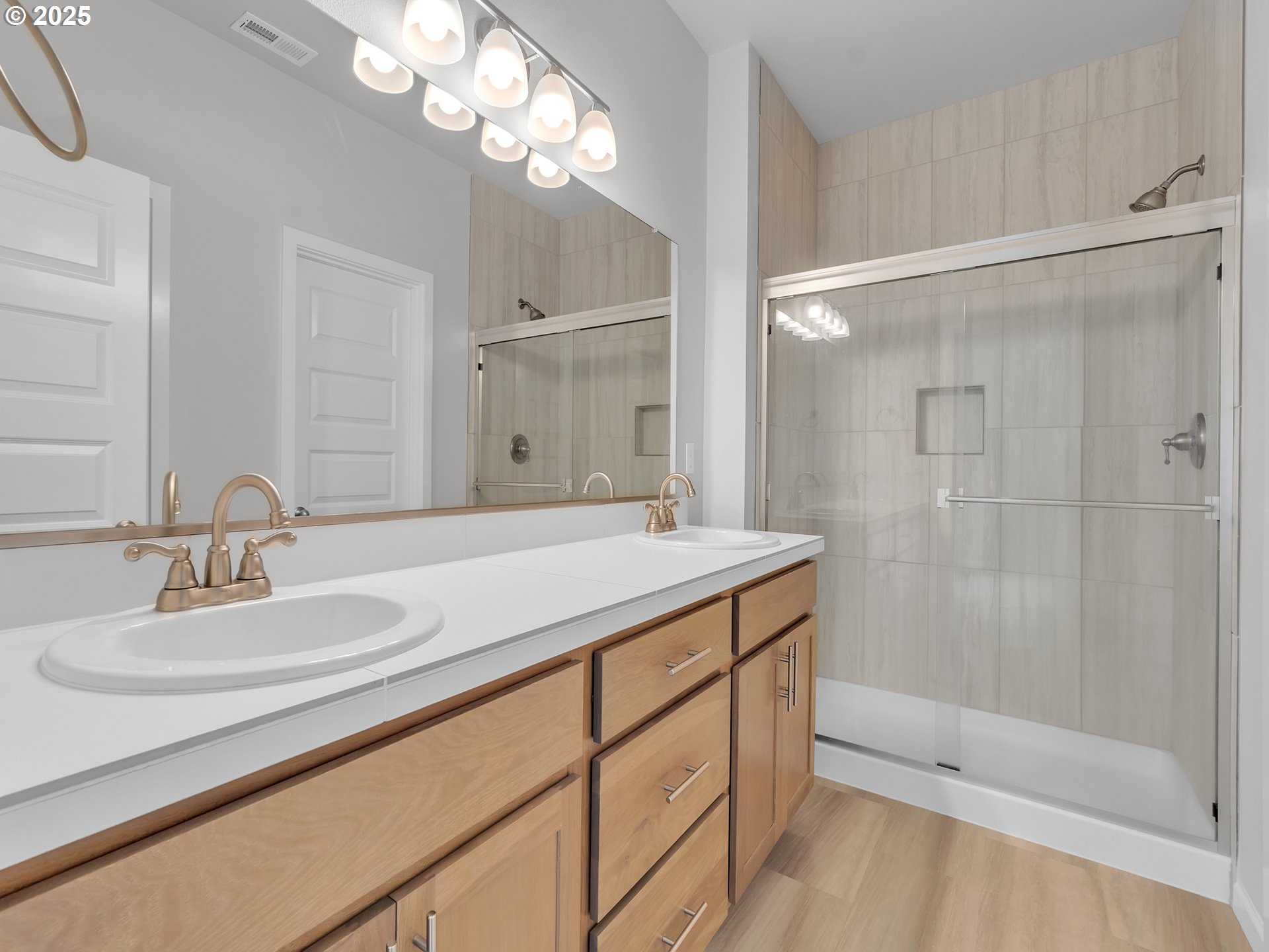 893 East Cleveland Street Carlton, OR 97111 - Photo 13 of 19 a bathroom with a sink double vanity granite tub and shower