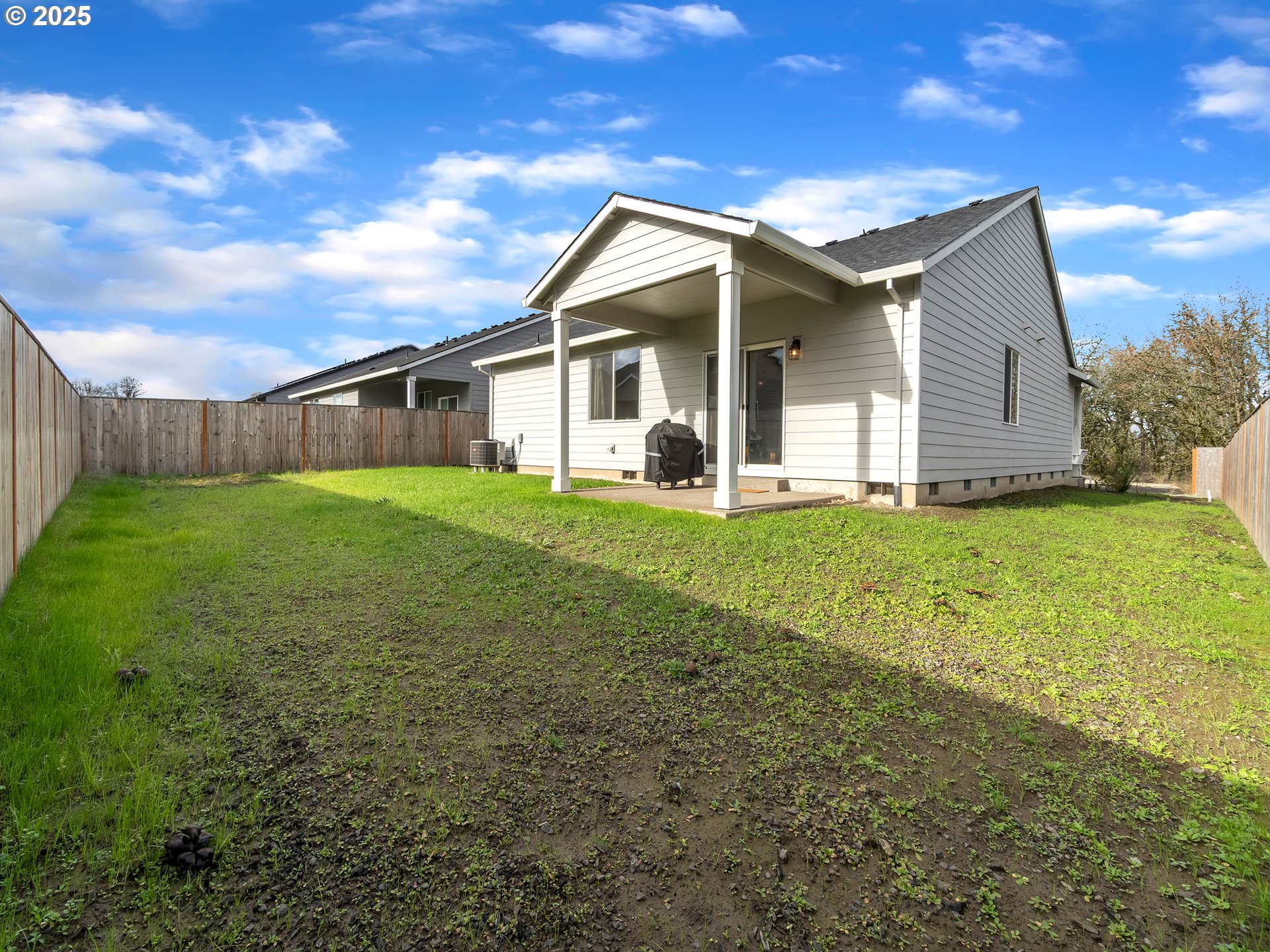 893 East Cleveland Street Carlton, OR 97111 - Photo 17 of 19 a view of a house with a yard