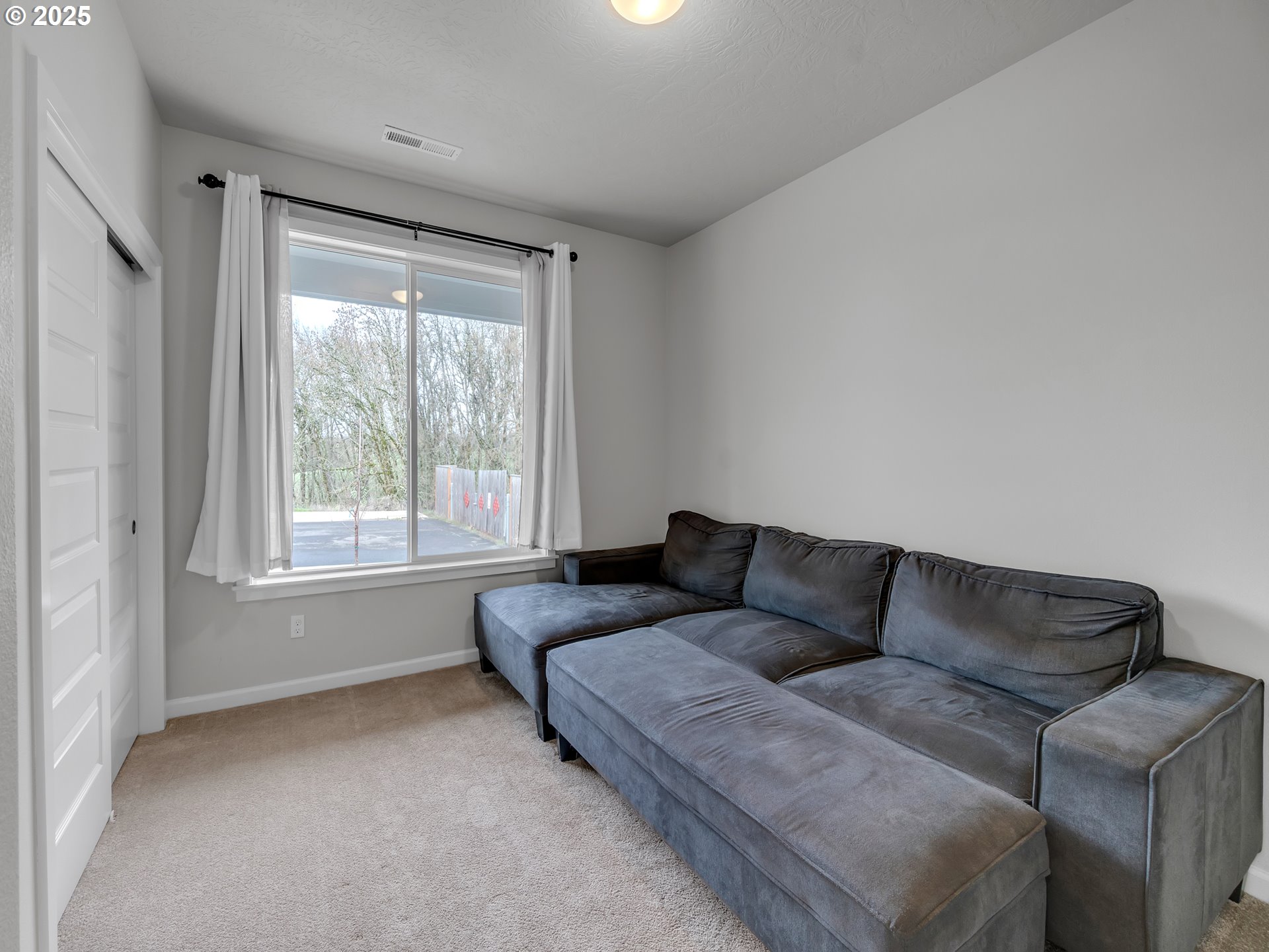 893 East Cleveland Street Carlton, OR 97111 - Photo 4 of 19 a living room with furniture and a window