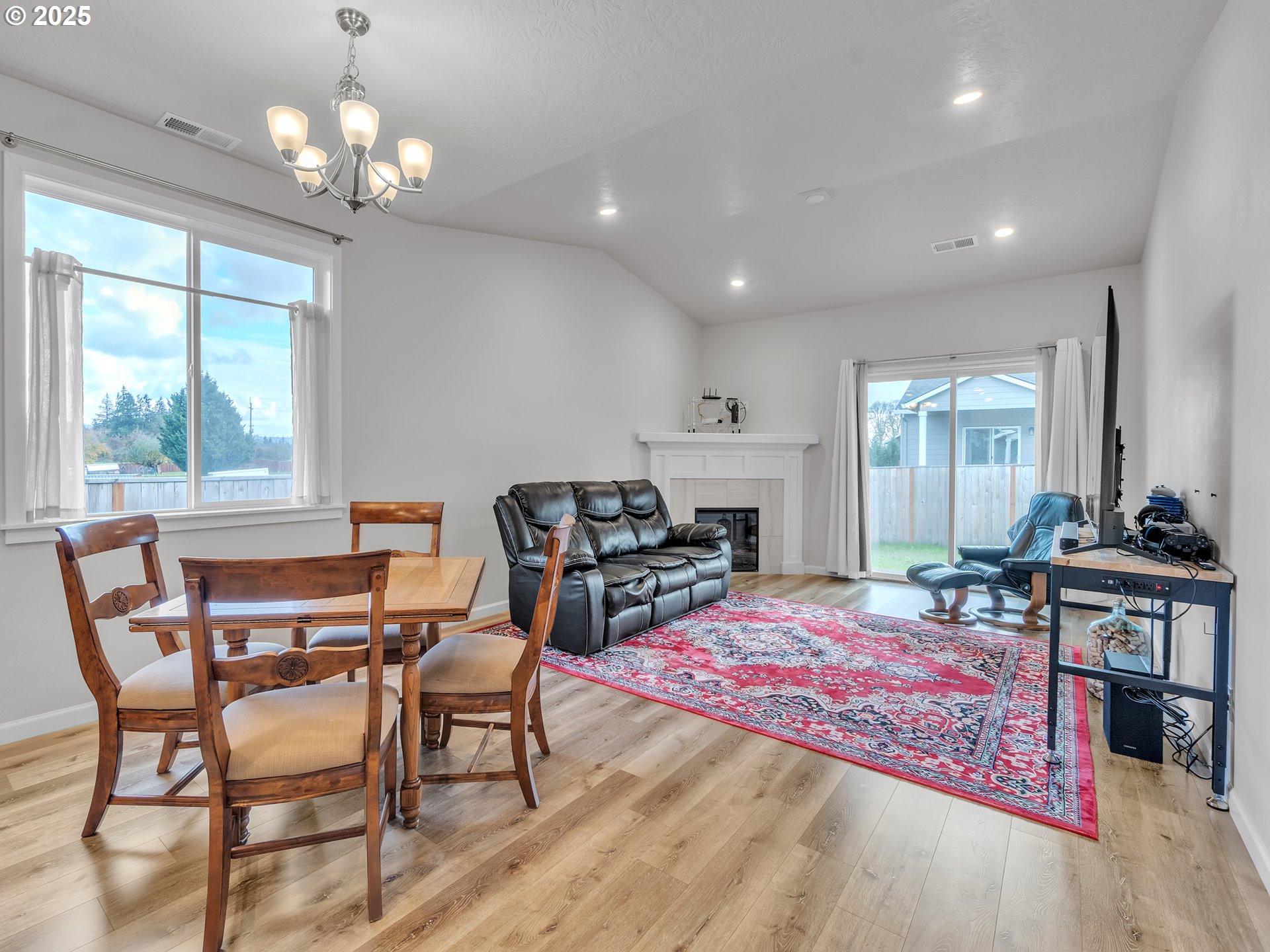 893 East Cleveland Street Carlton, OR 97111 - Photo 9 of 19 a view of a dining room with furniture window and wooden floor