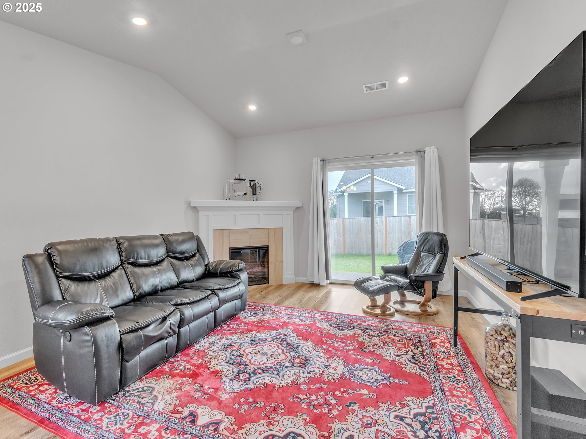 893 East Cleveland Street Carlton, OR 97111 - Photo 10 of 19 a living room with furniture and a fireplace