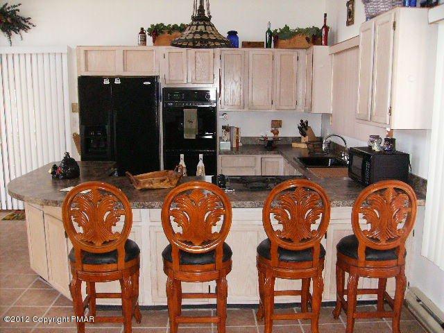 193 Cherry Ridge Road Layton, NJ 07851 - Photo 3 of 21 Kitchen w/Brkfst Bar & Lots of Cabinets