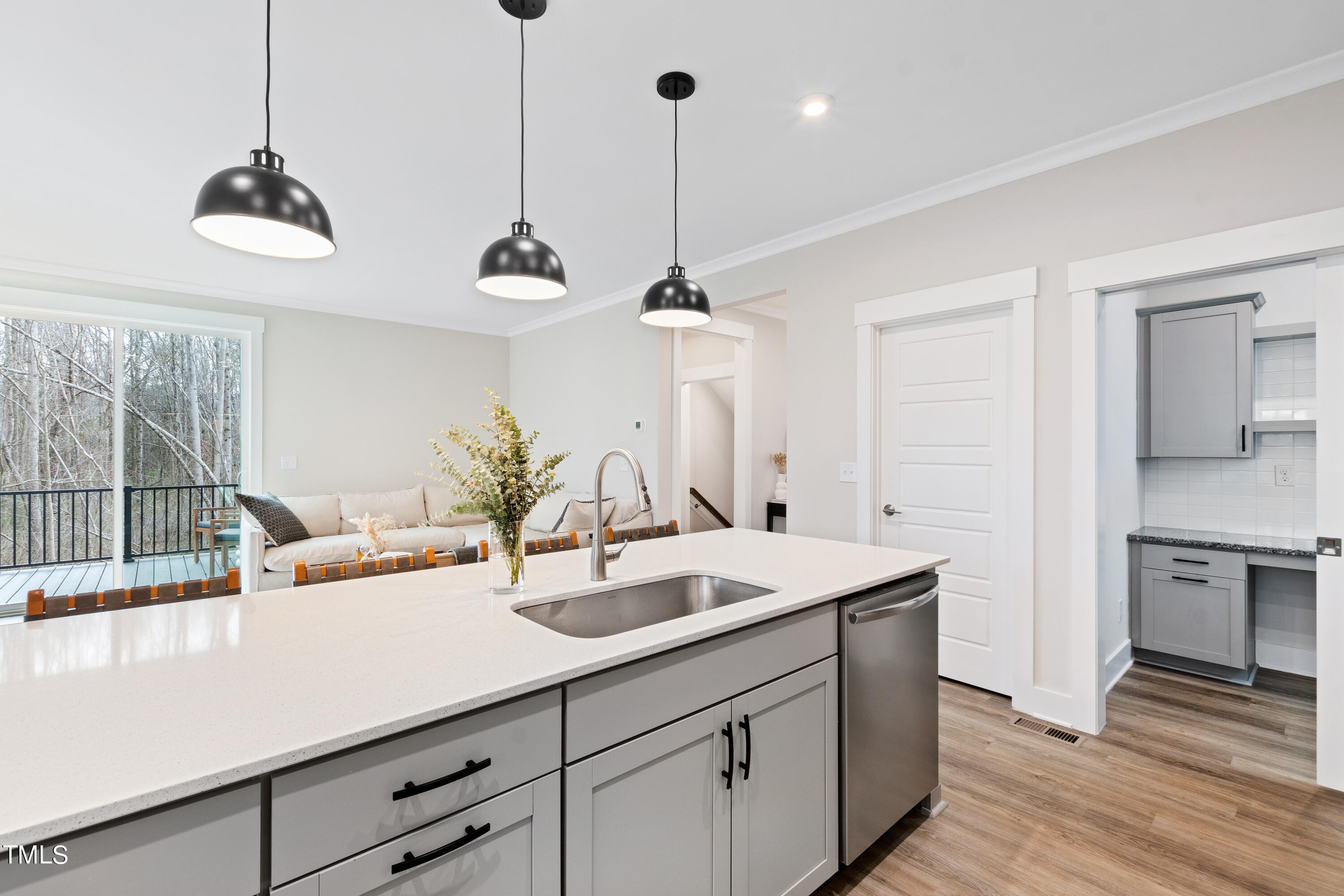 119 Dunloe Loop Raleigh, NC 27603 - Photo 18 of 51 a kitchen with a sink a counter space appliances and cabinets