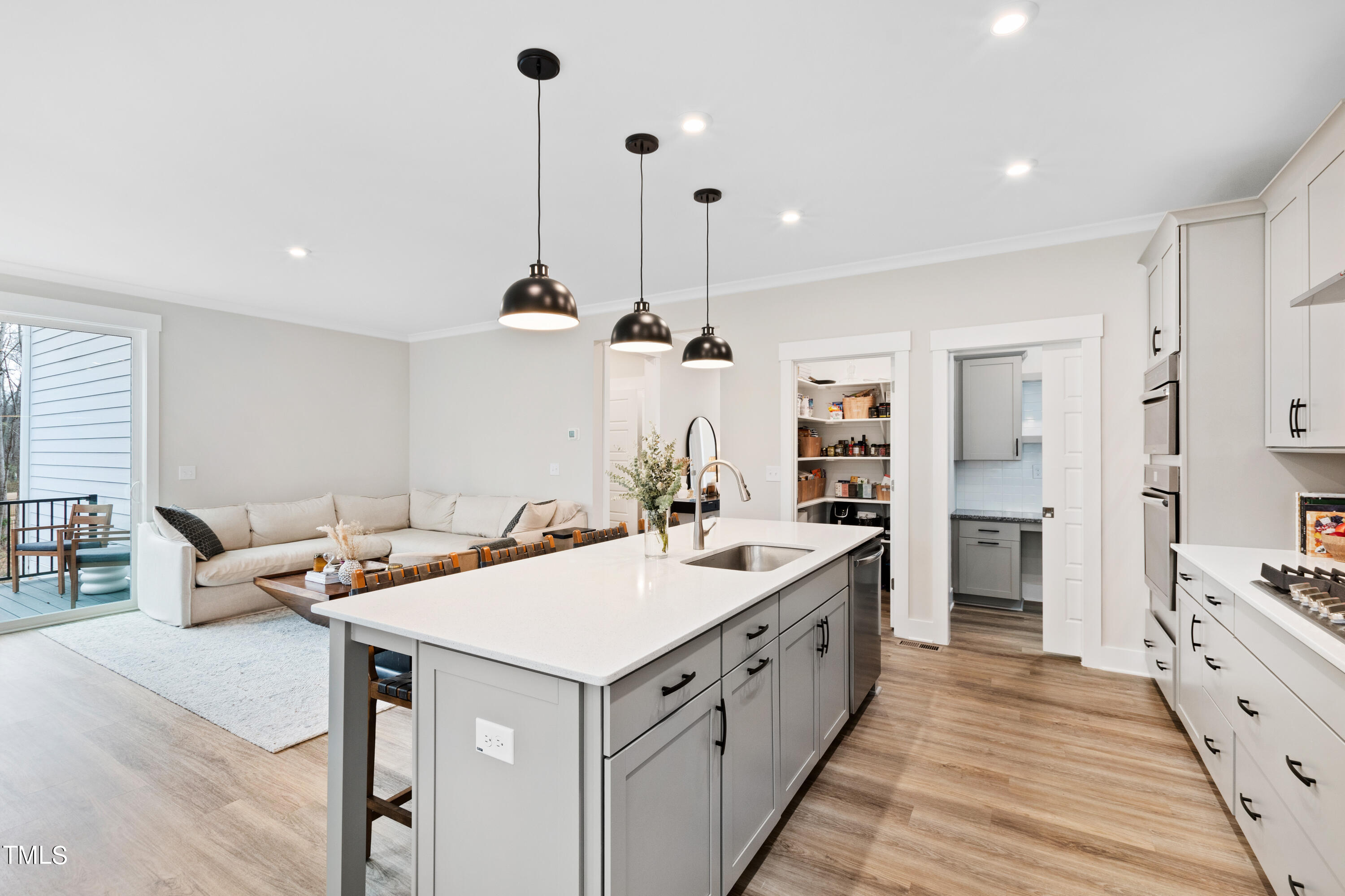 119 Dunloe Loop Raleigh, NC 27603 - Photo 19 of 51 a kitchen with a sink and stove